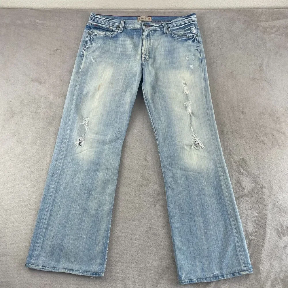 VTG BKE 67Jeans Buckle 36x33 Light Blue Wash Denim‎ Distressed Wide Leg Tyler